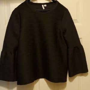 Black bell sleeved top